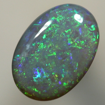 SOLID SEMI BLACK OPAL Sparkles of bright greens over blue
